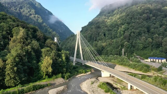 Aerial view of cable-stayed bridge and a new highway from Sochi to Krasnaya Polyana, Russia.