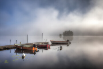 Fototapeta na wymiar Foggy morning at the lake Grycken, Stjärnsund, Sweden