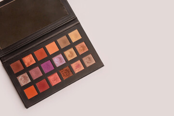 Eyeshadow palette of orange and brown shades