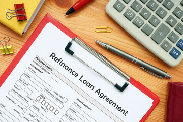 Business concept meaning Refinance Loan Agreement with inscription on the bank form
