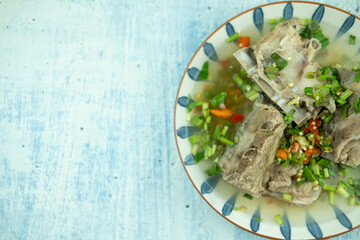 Spicy spare pork backbone or hot and spicy pork backbone hot pot.