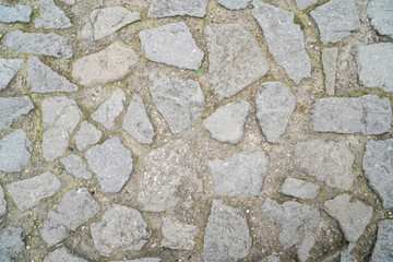 Structure of a stone as a pavement slab or as a brick