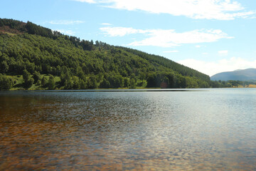 Fototapeta premium Paddling in Loch Pityoulish in the summer