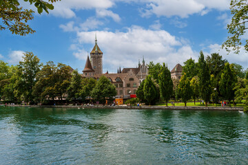 Fototapeta premium National Swiss Historical Museum In Zurich. Limmat river