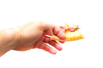 A slice of pizza in a man's hand on a white background. Isolated