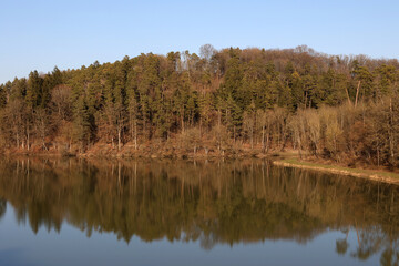 Fototapeta na wymiar Quiet lake on a clear sunny day