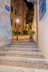 Fototapeta na wymiar Traditional Alleys with Stairs in the Old Historic Town of Chania, Crete Island, Greece. Beautiful and Romantic Streets.
