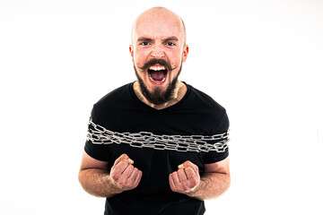 The man dressed in a black shirt poses in a photo studio.