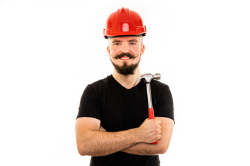 The man poses in a photo studio.