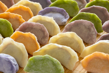 Multi color dumplings close up.