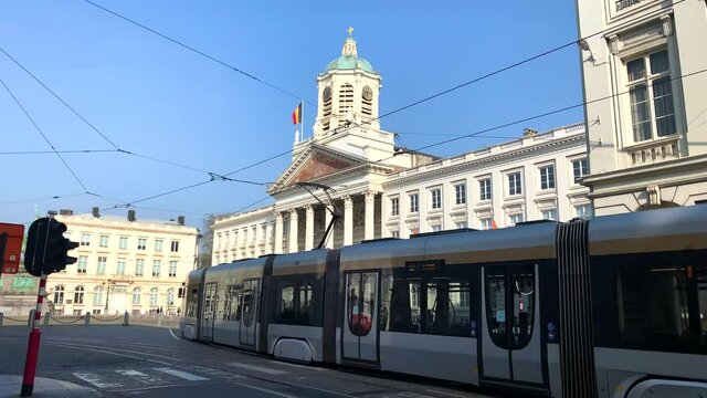 Real-time footage Electric tramway on its track during a sunny day