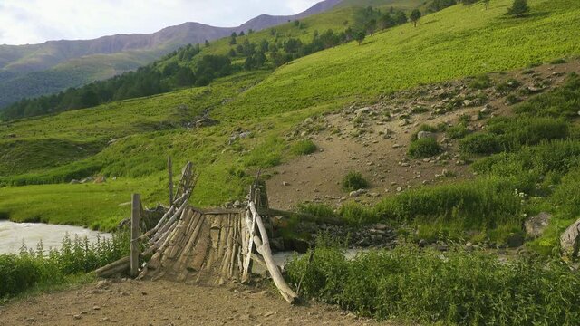 The old wooden cow bridge for cattle overlanding to the summer pasture in mountain