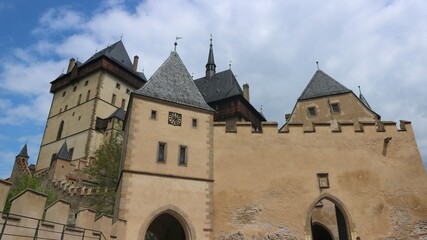 A view to the medieval castle Karlstejn with blue sky above at Czech republic