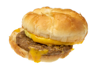 Side view of a croissant sausage egg and cheese breakfast sandwich