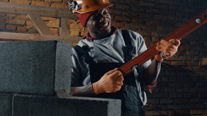 African American man singing on construction site