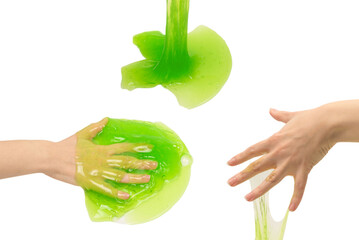 Green slime toy in woman hand isolated on white background.