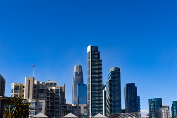 Fototapeta na wymiar Dramatic San Francisco Bay Area California city skyline clear sky with skyscrapers