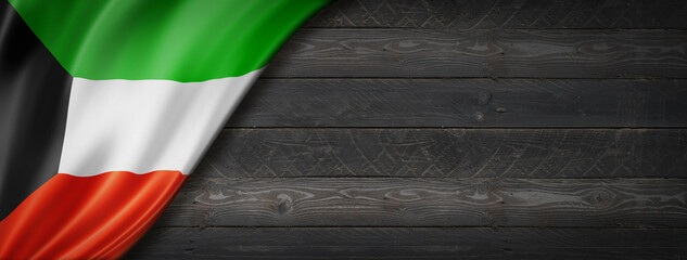 Kuwaiti flag on black wood wall banner