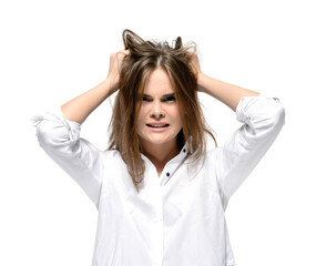 Angry woman rips her hair. Problems, headache, stress and depression concept