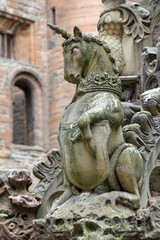 unicorn statue on castle fountain 