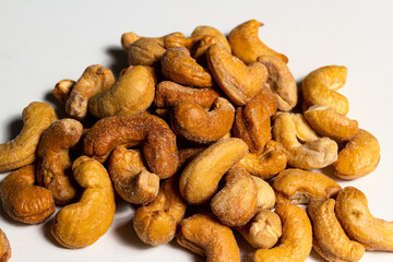 Cashew nut isolated on a white background. Top view and selective focus