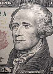 Engraved portrait of Alexander Hamilton on a USA ten dollar bill.