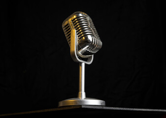 Vintage retro Microphone closeup view with yellow light