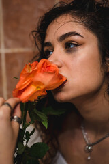 Naked and wet young model looking sad, thoughtfully and depressed in bath.