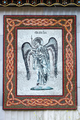 Mosaic on the facade of the building with the image of the Archangel