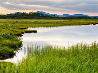 Lake in front of mountains
