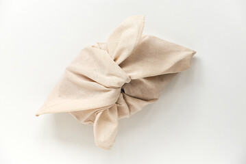 Fototapeta na wymiar Linen bento bag. Organic cotton bread bag. Reusable azuma bukuro bag. Japan origami lunch bag.