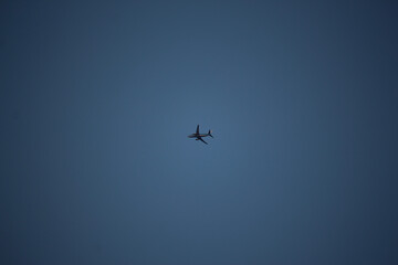 Clear blue skies with passengers being flown through it
