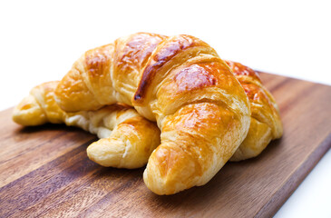 fresh croissants isolated on whte
