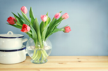 Image of kitchen table with tulips flowers