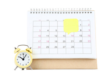 Fototapeta na wymiar Calendar page with speech bubble and alarm clock on white background