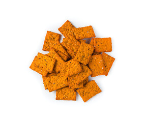 Tomato crackers with sea salt and spices isolated on a white background.