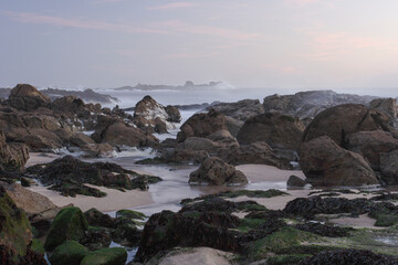 Fototapeta na wymiar Rocky seascape in the evening