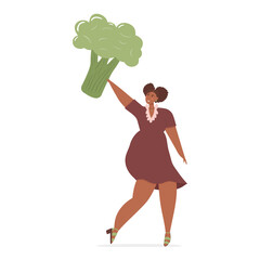 Happy black woman holding giant broccoli over her head. Healthy diet and healthy lifestyle concept.