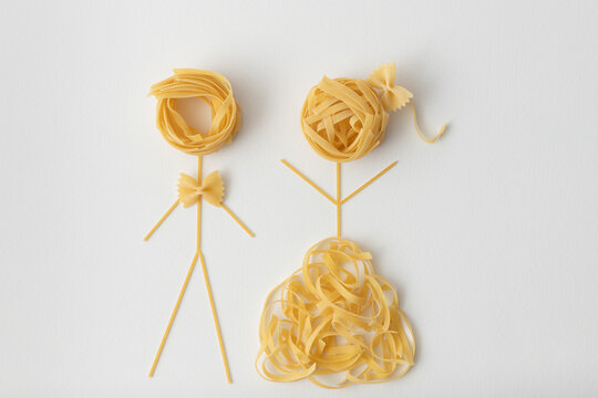 Creative and fun minimal flat lay concept made of food representing beautiful young wedding couple