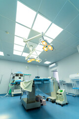 Surgery room in new modern hospital. Quarantine medical operating room with lights.