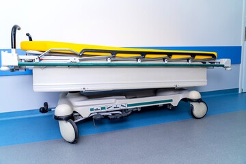 Emergency bed staying in hospital. Medical equipment for emergency service.