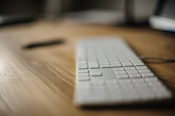 A fraction of an home office situation from Covid-19 - a keyboard and some office appliances