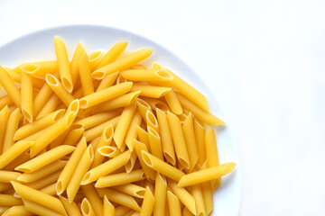 Yellow delicious pasta close-up on a white plate