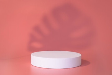 White podium on the pink background with leaves shadows. Podium for product, cosmetic presentation. Creative mock up. Pedestal or platform for beauty products.