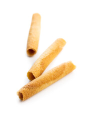 Sweet waffle tubes rolls isolated on white background.