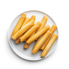 Sweet waffle tubes rolls on plate isolated on white background.