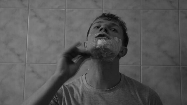 portrait of a man razor. Shadow. Video. 