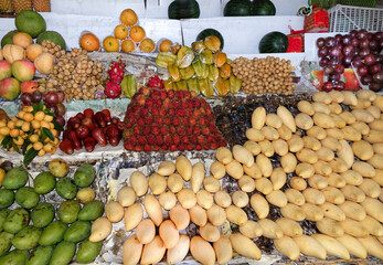 Fresh fruit, colourfully displayed at a market