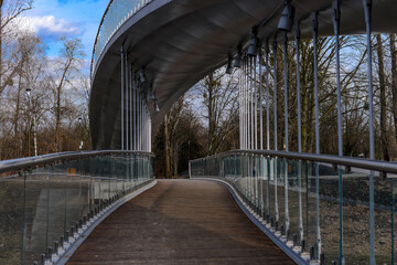 Fototapeta na wymiar Glass bridge in the park in Lublin