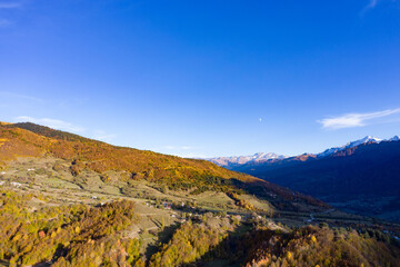Fototapeta na wymiar Top view of the autumn forest mountains at sunset
